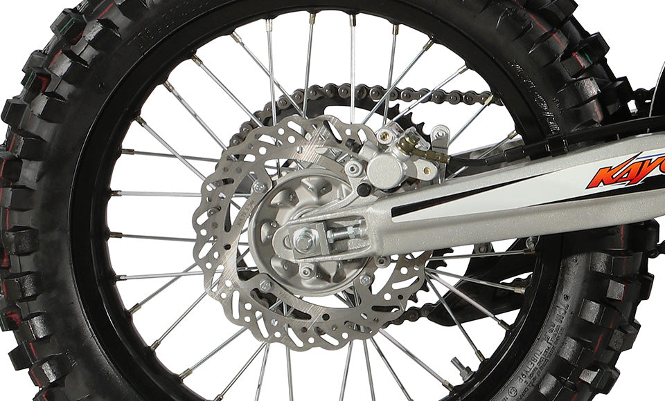 KAYO K4 250 rear 3/4 left angle view showing aluminum swingarm, chain drive, and taillight