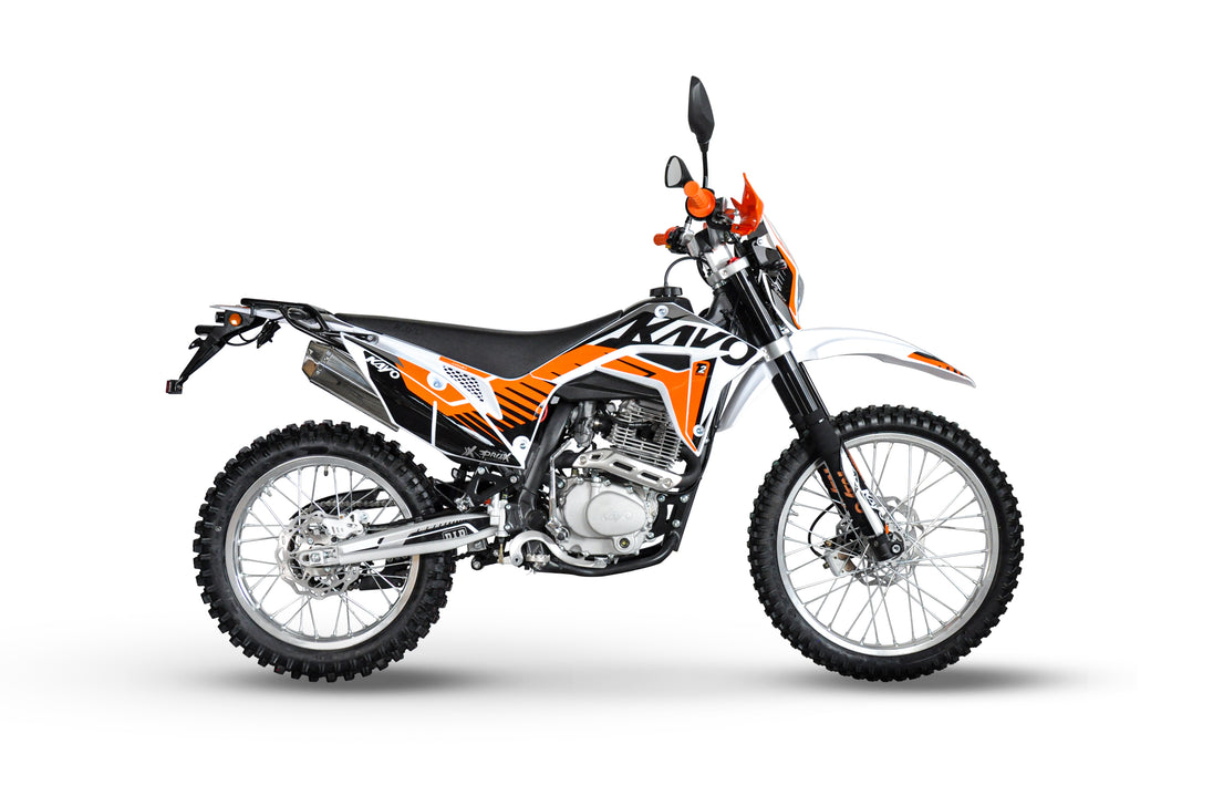 KAYO T2 Enduro motorcycle riding along forest trail in outdoor off-road conditions
