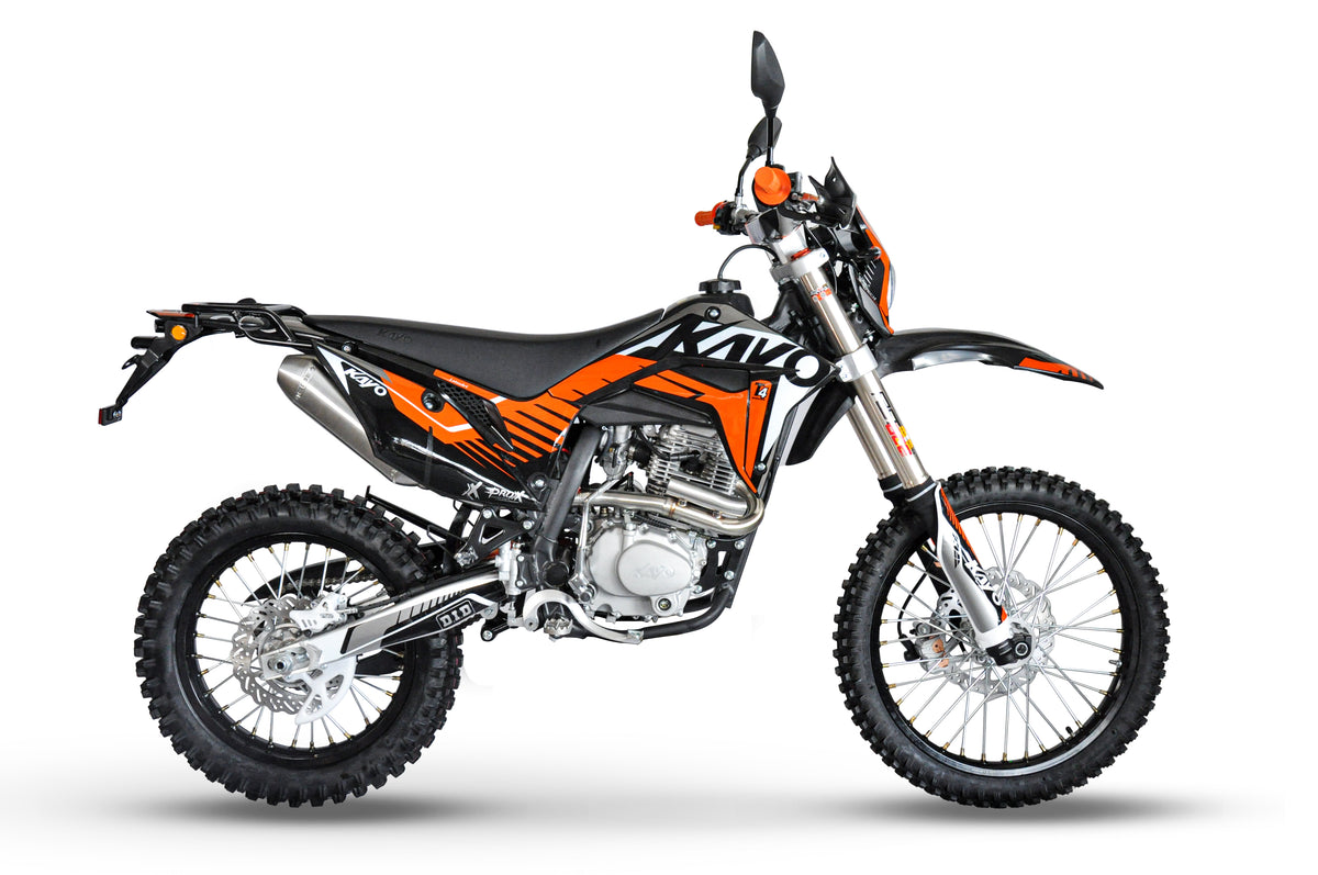 KAYO T4 Enduro right profile view showing exhaust, rear luggage rack, and spoked wheels