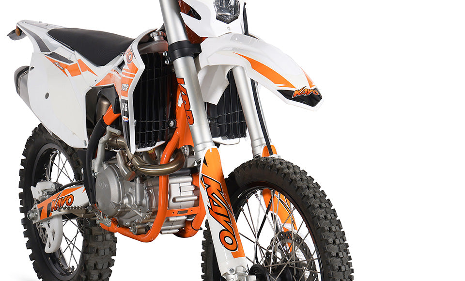 KAYO K6 249.6cc DOHC engine right side, stainless exhaust header, and frame guard detail