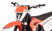 KAYO T4 Enduro front inverted fork, brake disc guard, and 21-inch knobby tire close-up