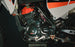 KAYO K5 279.6cc liquid-cooled engine, red cylinder head, and radiator hose detail